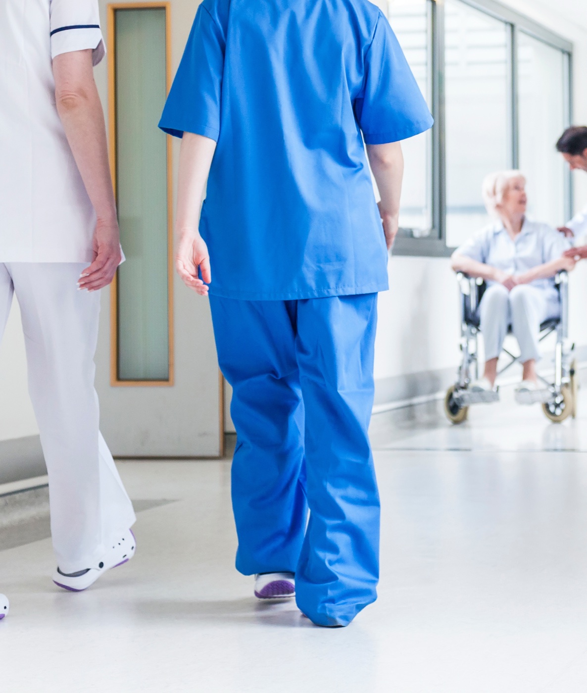 Worker on their feet all day wearing Surefoot custom orthotics