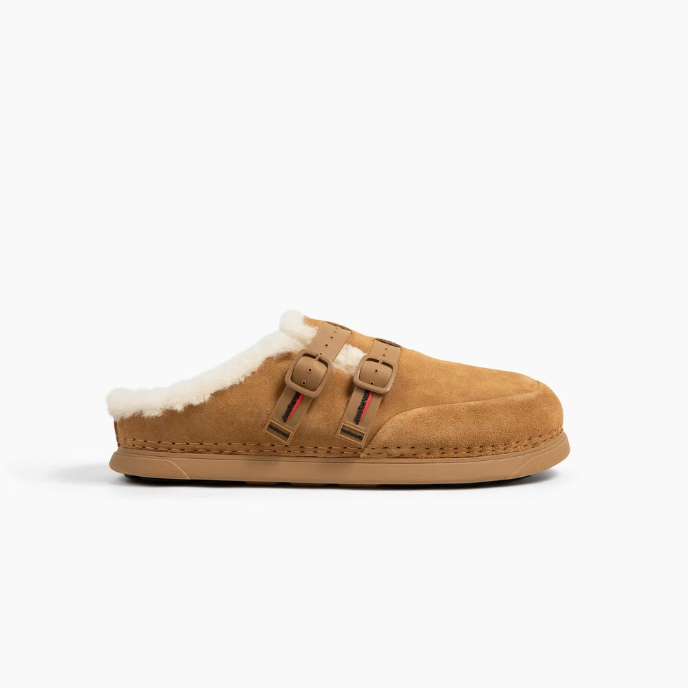 The Surefoot Après Clog in khaki suede with shearling lining