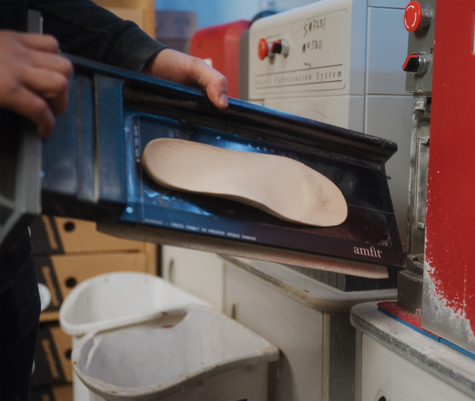 Custom orthotic being CAD/CAM milled from an EVA blank on a three-axis machine